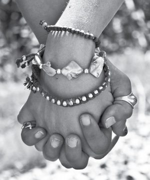 Hands holding each other photo